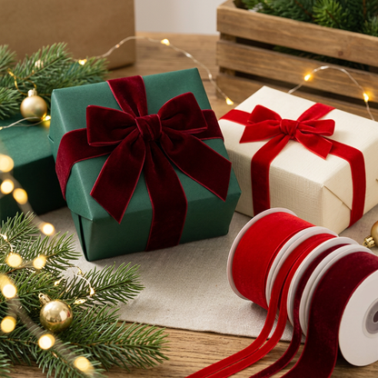 Red flocked ribbon styled on Christmas gift parcels